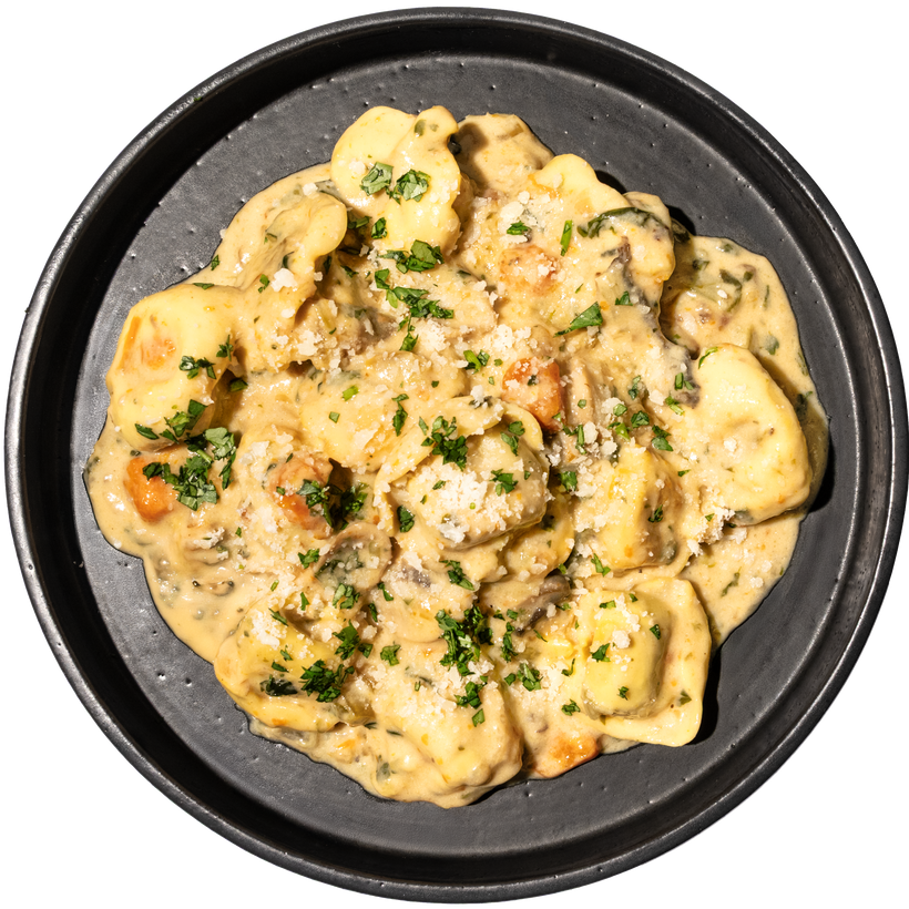 11 - Tortellini de Costilla de Res con Boloñesa de Champiñones Asados y Queso Parmesano