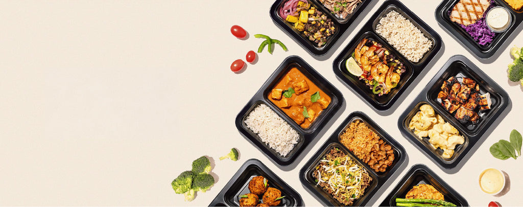 Assorted food containers on a beige background