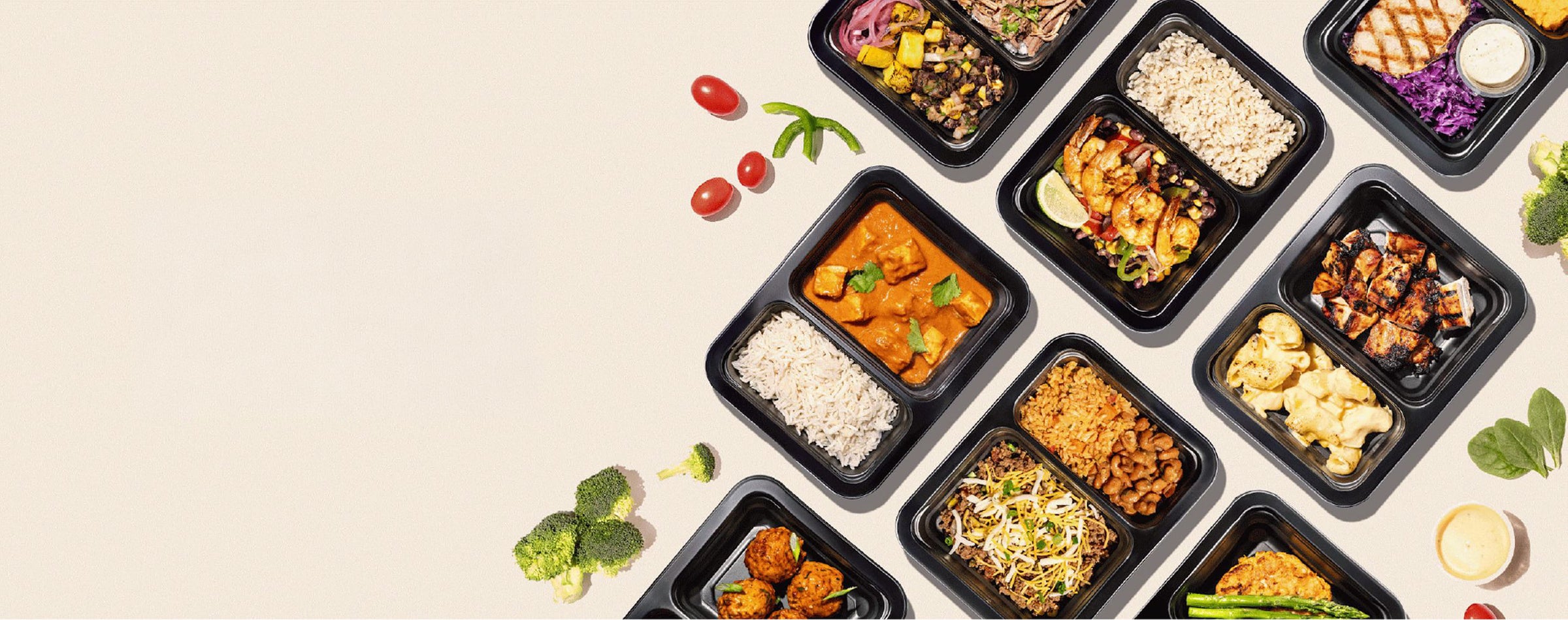 Assorted food containers on a beige background